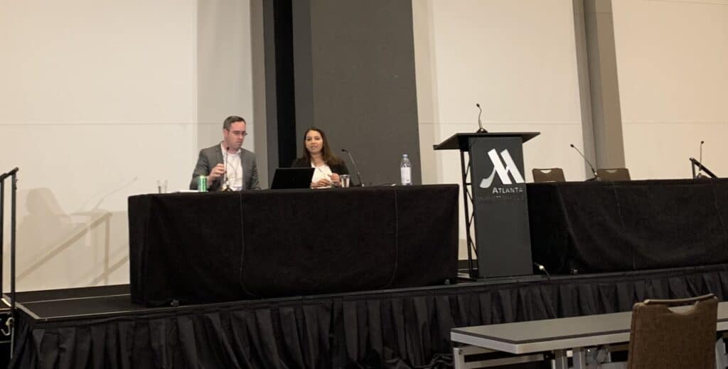 Insiya Bream and Darragh McNally presenting their comprehensive learner record prototype at the IMG global digital credentials summit in 2022.